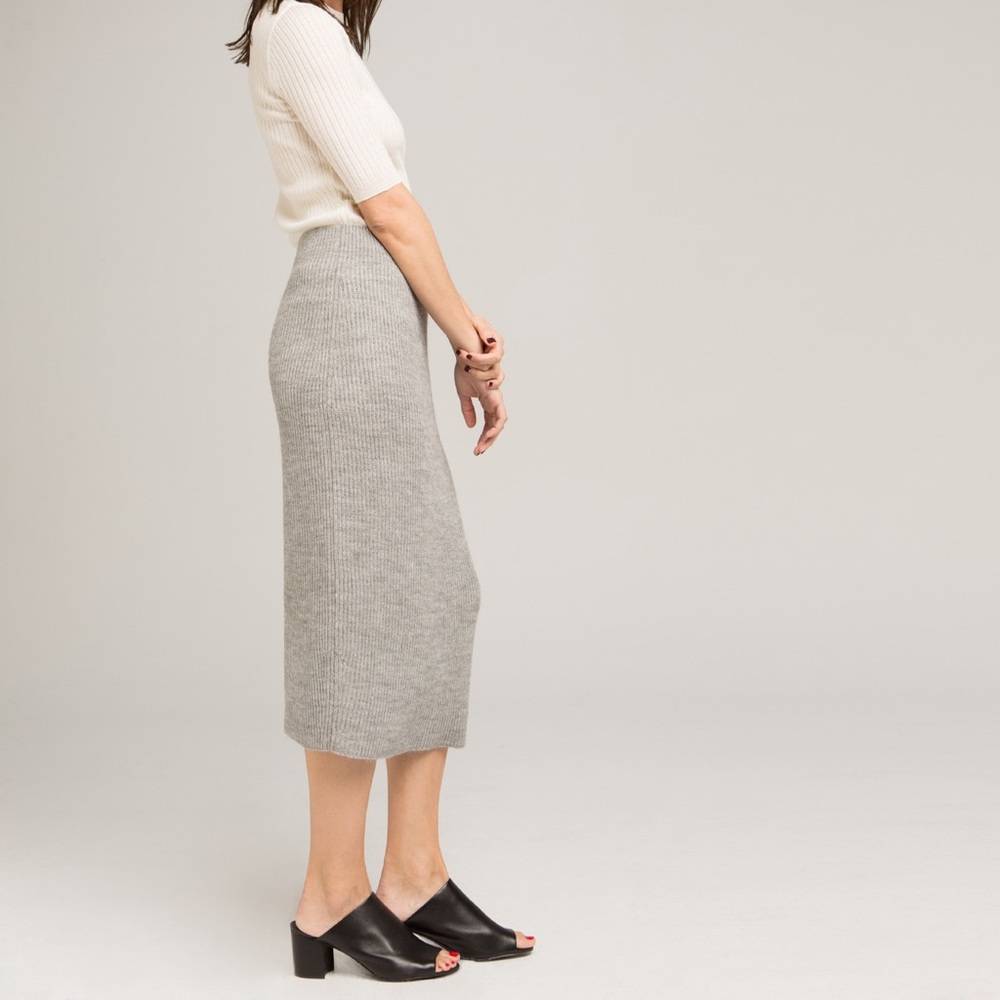 Micaela Greg gray skirt hits at mid calf